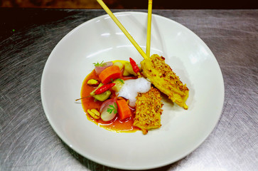 Creative food, Pork Satay with Peanut Sauce on stainless table, art food, Thai modern food, Pork Satay on Plate 