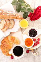 breakfast with coffee cup and croissant