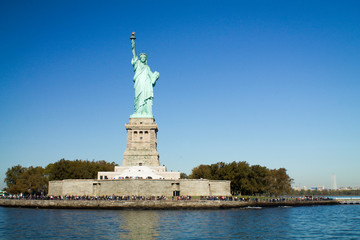 Fototapeta premium The Statue of liberty at liberty island in New York City