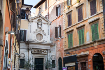 Fototapeta na wymiar The facade of Santa Barbara dei Librari church in Rome, Italy