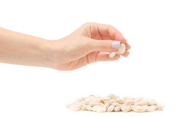 Female hands with white beans