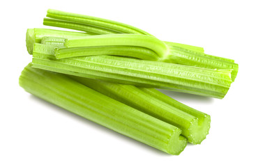 Fresh celery stalks on a white background