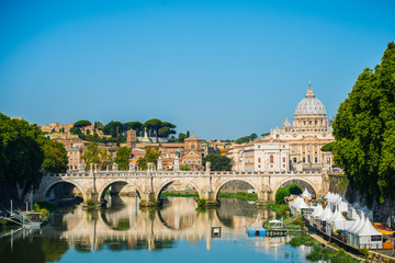 St. Peter's cathedral over bridge and river in Rome, Italy