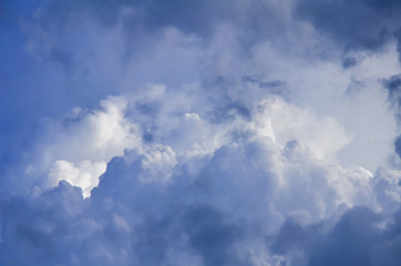 cloudy cover of the sky or weather.