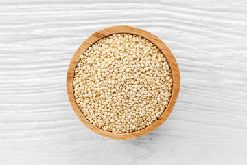 Quinoa seeds on wooden background