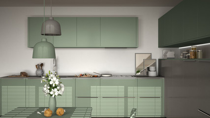 Modern kitchen with table and chairs, cooking pan and food, close-up, white and myrtle green minimalist interior design