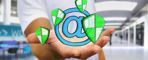 Businessman holding a hand-drawn antivirus system