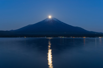 Pearl Fuji , Full moon overlaps the  Top of Mt. Fuji at Lake Yamanakako in spring morning
