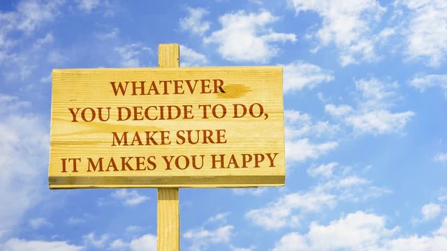 Whatever you decide to do, make sure it makes you happy. Words on a wooden sign against time lapse clouds in the blue sky. 