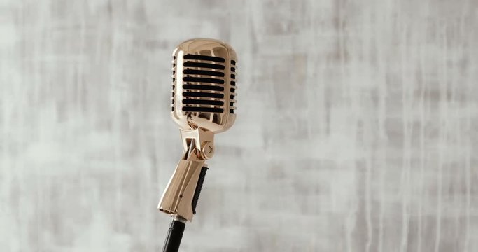 Concert microphone on stage on white background. close up