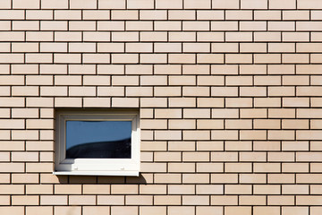 window in a brick wall in the house