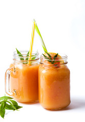 Grapefruit smoothie with marijuana leaves