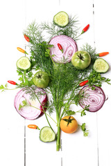 Spices red onion and herbs on a white wooden background
