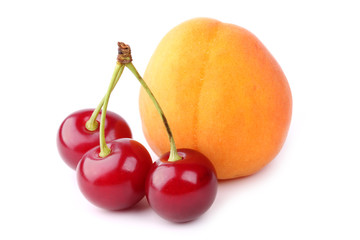 Cherry and apricot isolated on white background