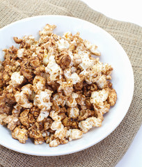 Close - up Caramel chocolate popcorn in white plate
