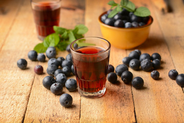 blueberry juice on wooden table