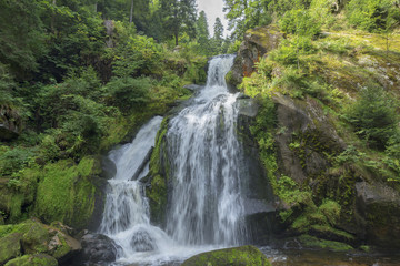 Fototapeta na wymiar The waterfall in the village of Triverg in Germany