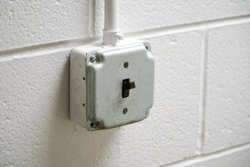 Old power switch on the wall