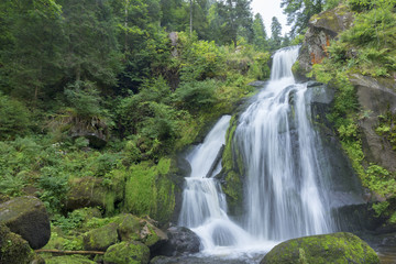 Fototapeta na wymiar The waterfall in the village of Triverg in Germany