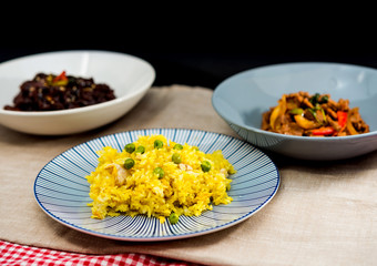 Homemade Chinese fried rice with vegetables and fried eggs
