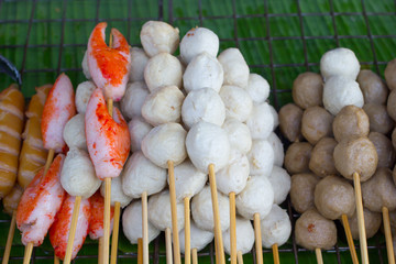 Various meat ball on stick selling beside the street of Thailand