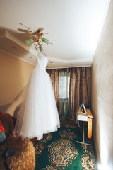 dress hanging from the chandelier