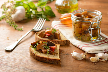 eggplant in olive oil in glass jar © al62