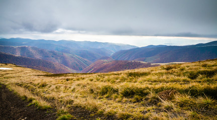 Fototapeta premium Autumn mountains in cloudly day