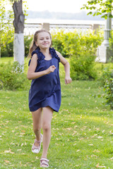 Caucasian girl run in summer with disheveled hair