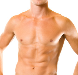Fototapeta premium Close up of muscular male torso, over white