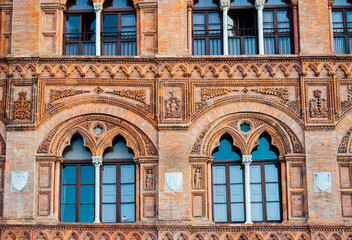 Fototapeta na wymiar Decorations and Windows of Palazzo Agostini
