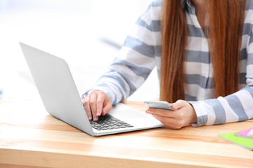 Young woman working at home