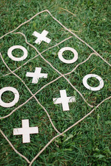 entertainment, amusement, outdoor conept. there is popular game called tic tac toe created with...