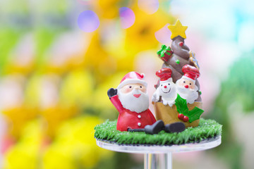 Santa Claus and Christmas gift Signs of Christmas toy souvenir with colour of bokeh background.