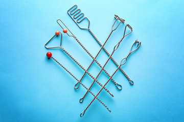 Fototapeta premium Set of logopedic probes for speech correction on color background