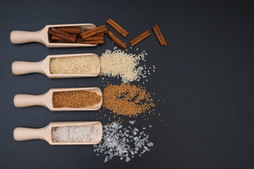 Aromatic spices on a black background.Top view