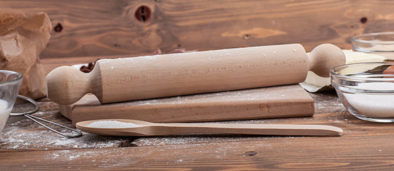 Food ingredients for dough a wooden kitchen board. Cake recipies