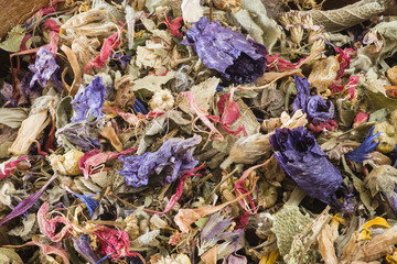 Flower potpourri in a wood bowl.