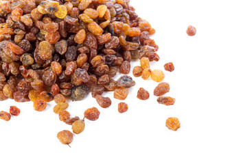 Dried raisins on a white background