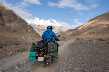 Biker in a desert road,