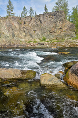 Naklejka na ściany i meble The mountain river Haramatalow in the Polar Urals.