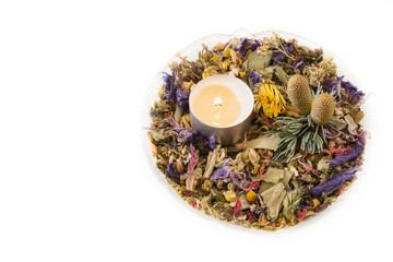 Flower potpourri in a glass bowl.