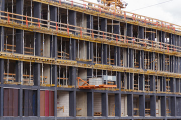 Monolithic building - Slip formwork. The construction of a precast concrete building in a monolithic way.