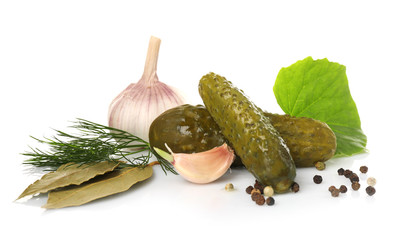 Composition with pickled cucumbers on white background