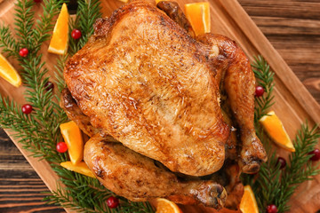 Roasted turkey on wooden board
