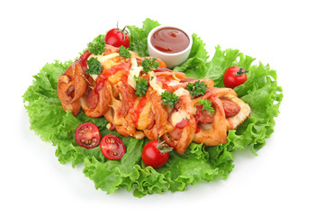 Tasty pastry with sausage on white background