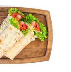 Tasty lavash rolls with sausages and vegetables, isolated on white