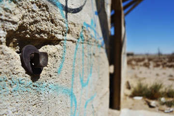 Close up of ruined stone building in the desert.