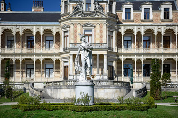 Palace Hermesvilla with the marble statue of Hermes in front of it in the wildlife preserve Lainzer...