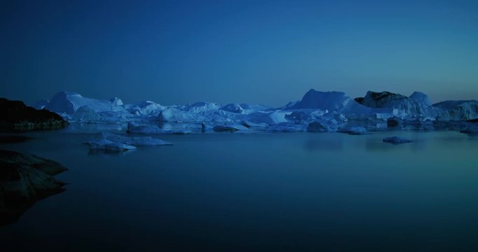 Icebergs floating in Disko bay in Greenland